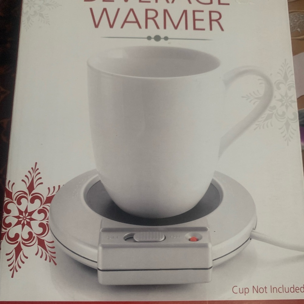 White Mug on Silver Beverage Warmer